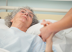 Dementia Care in Boca Raton for elderly woman in bed